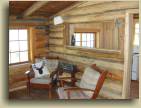 The living room in the Up Top log cabin